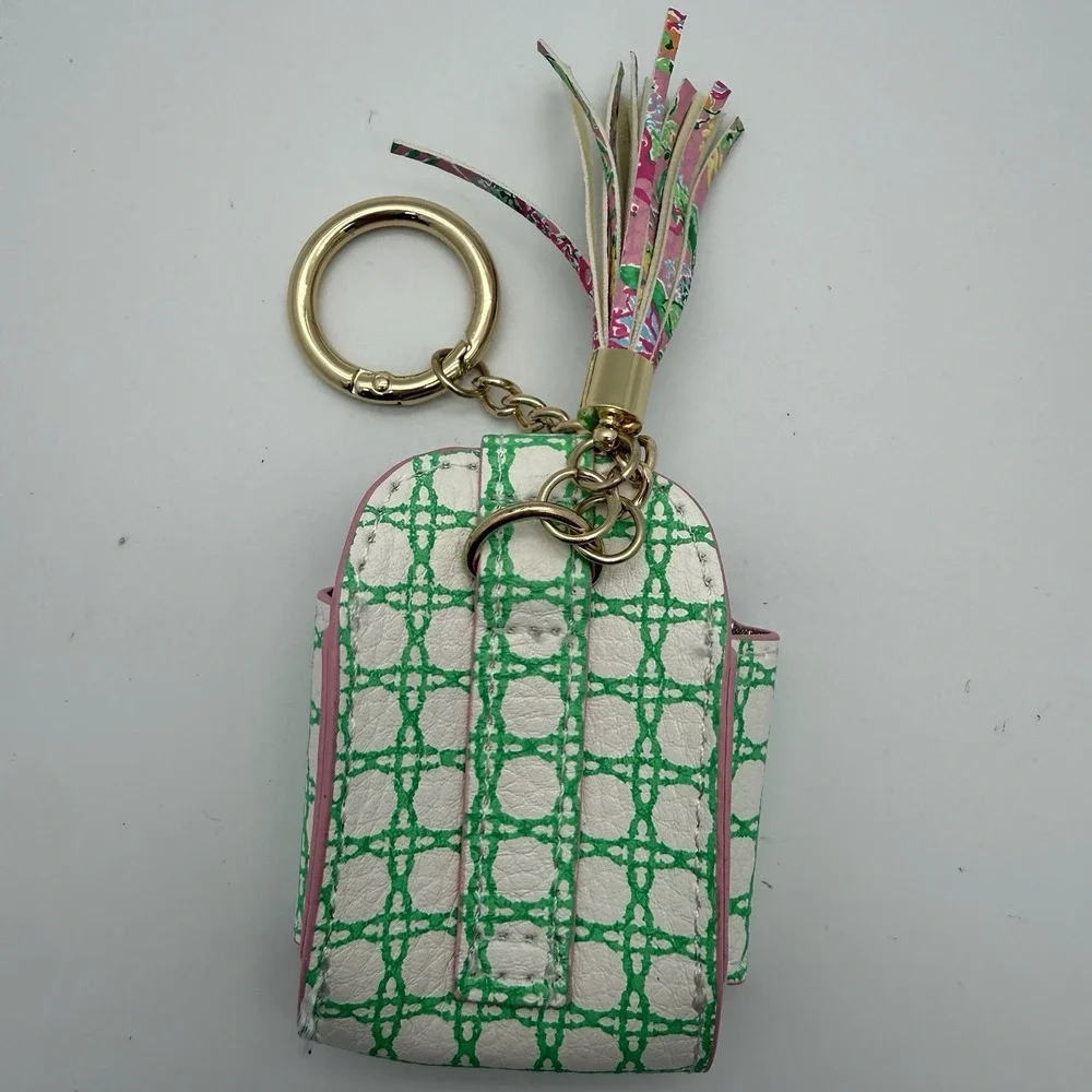 Lilly Pulitzer faux leather wireless earbud case in the Spearmint Caning Print